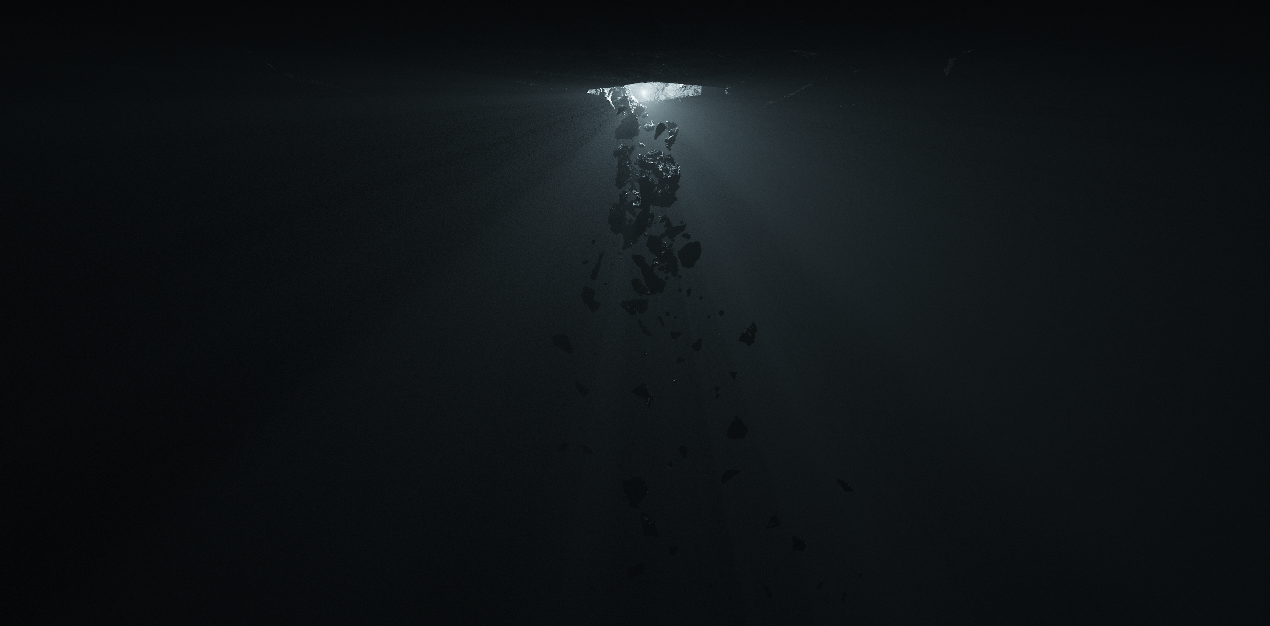 Dramatická scéna padajících kamenů nasvícená ostrými paprsky světla. Atmosférický vizuál symbolizující destrukci a znovuzrození v grafickém projektu pro Lenku Dusilovou.