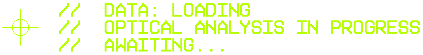 Green digital display showing message 'DATA: LOADING OPTICAL ANALYSIS IN PROGRESS AWAITING...' on black background.