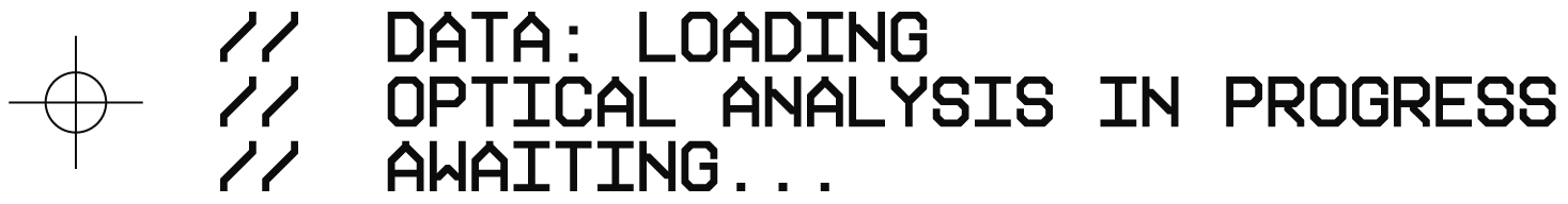 Digital display with text reading 'DATA: LOADING OPTICAL ANALYSIS IN PROGRESS ANALYTIC...'