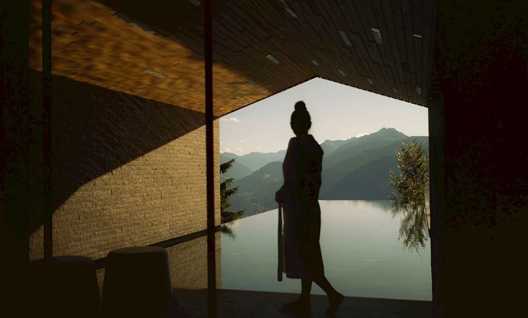 A view from the infinity pool suspended high above the Dolomites at the Hotel Miramonti in Italy.