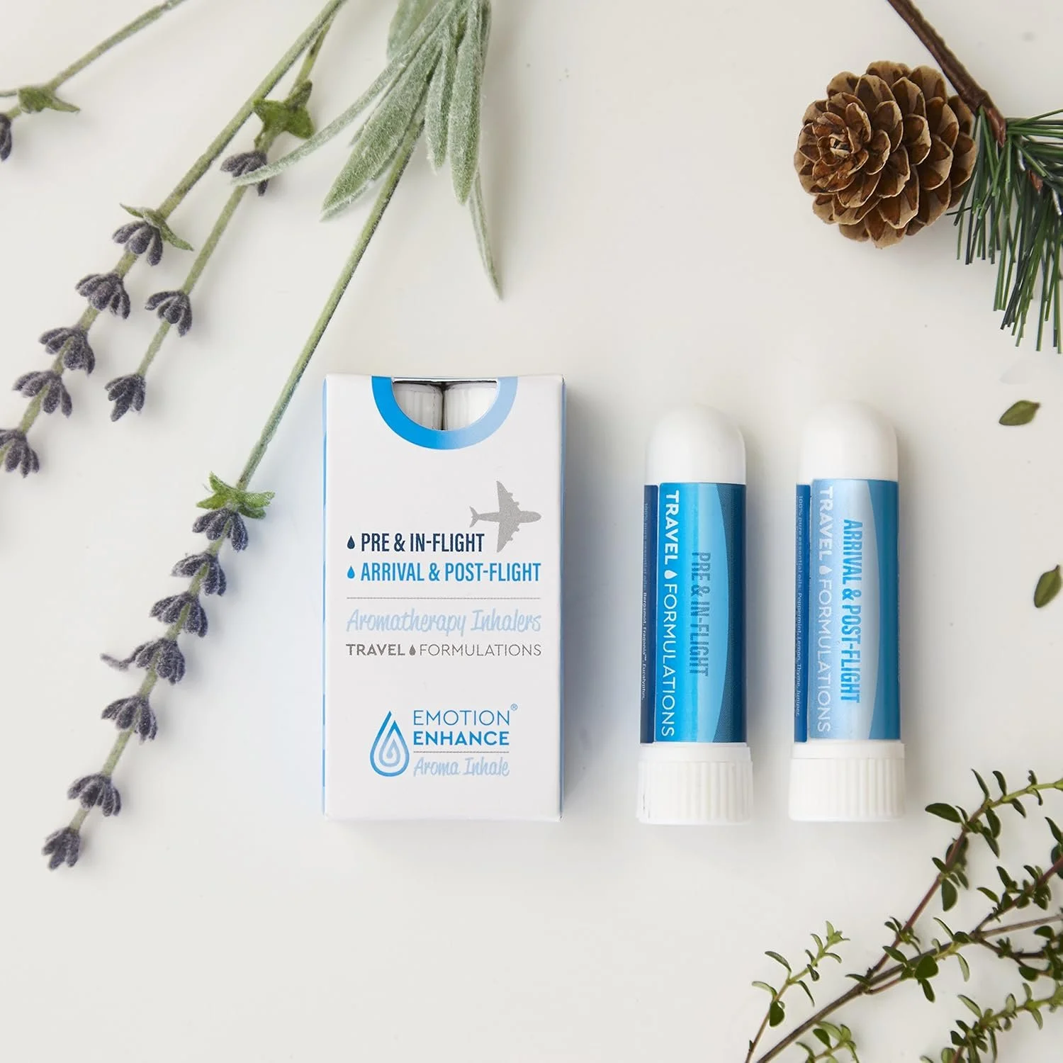 Two Emotion Enhance aromatherapy inhalers, one for before your flight, one for when you land.