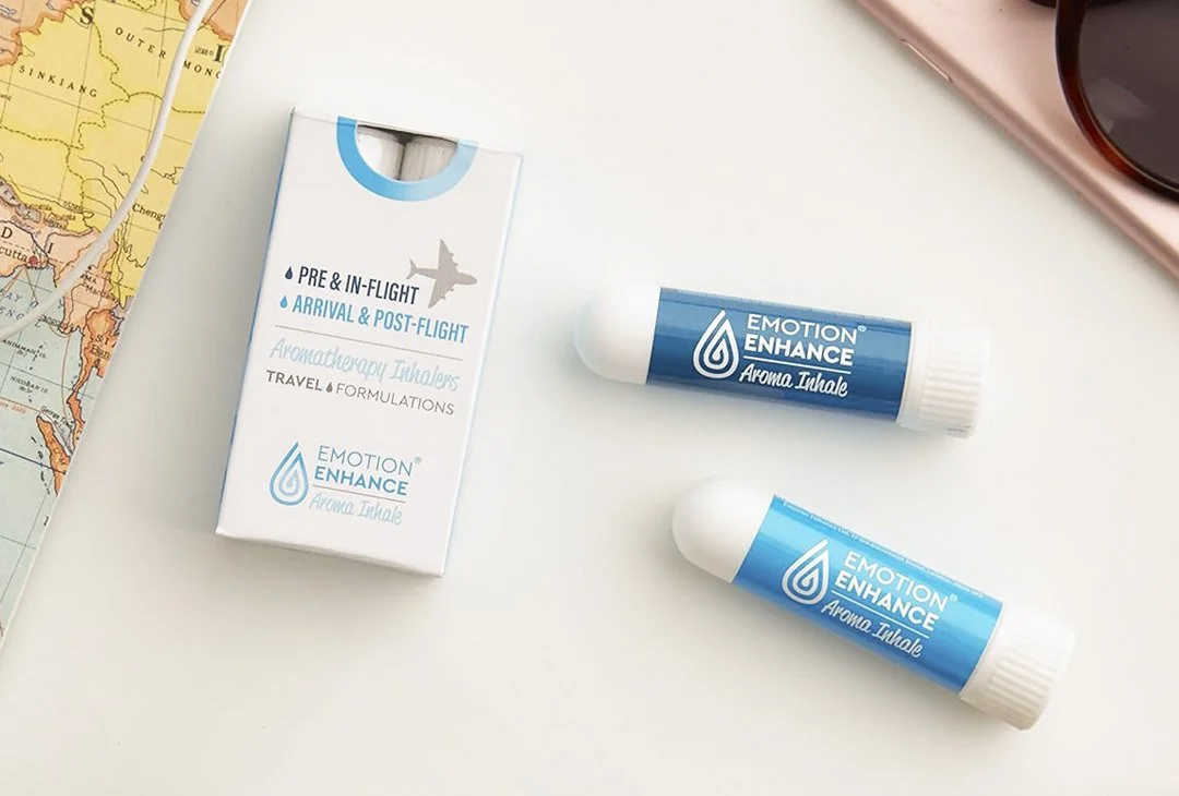 Two Emotion Enhance aromatherapy inhalers, one for before your flight, one for when you land.