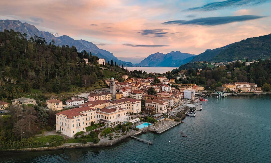 An aerial view of Villa Serbolloni at sunset, on the shores of Lake Como in Italy.