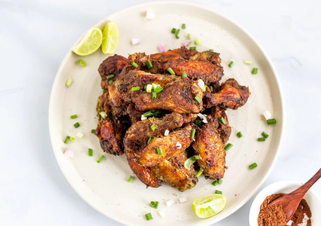 A plate of Caribbean inspired jerk chicken at Agent Nouveau