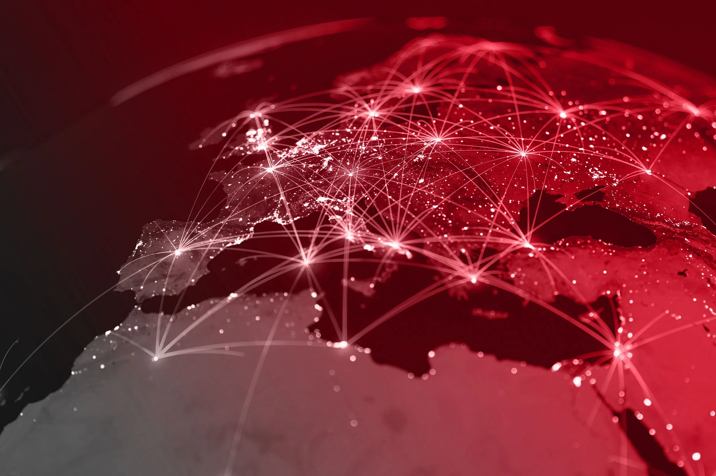 Digital image of a map of Europe with illuminated interconnected points, representing global connectivity and communication.