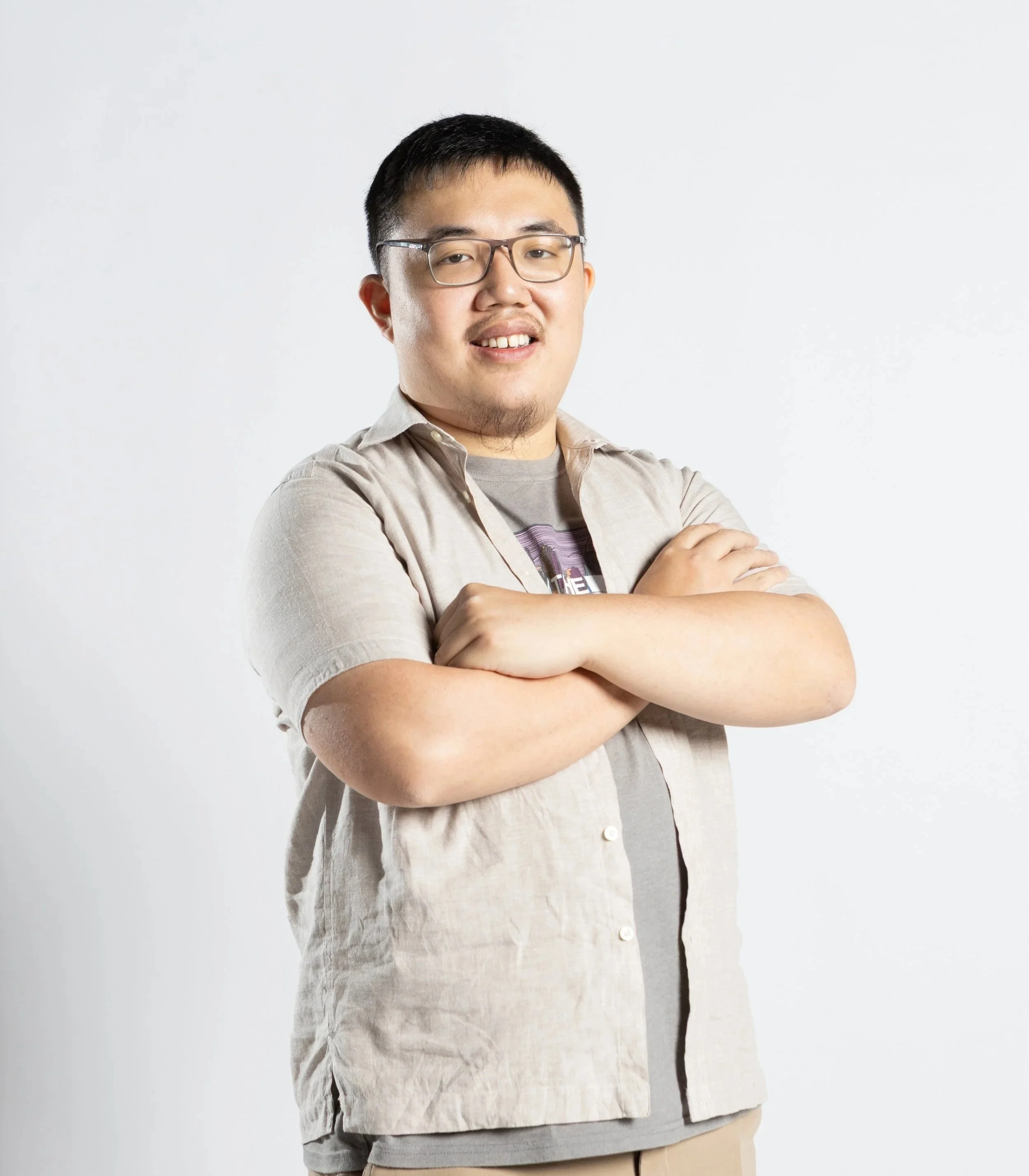 A neurodivergent team member employed at PUPA Center, contributing professional skills and lived experience to inclusive education and program development.