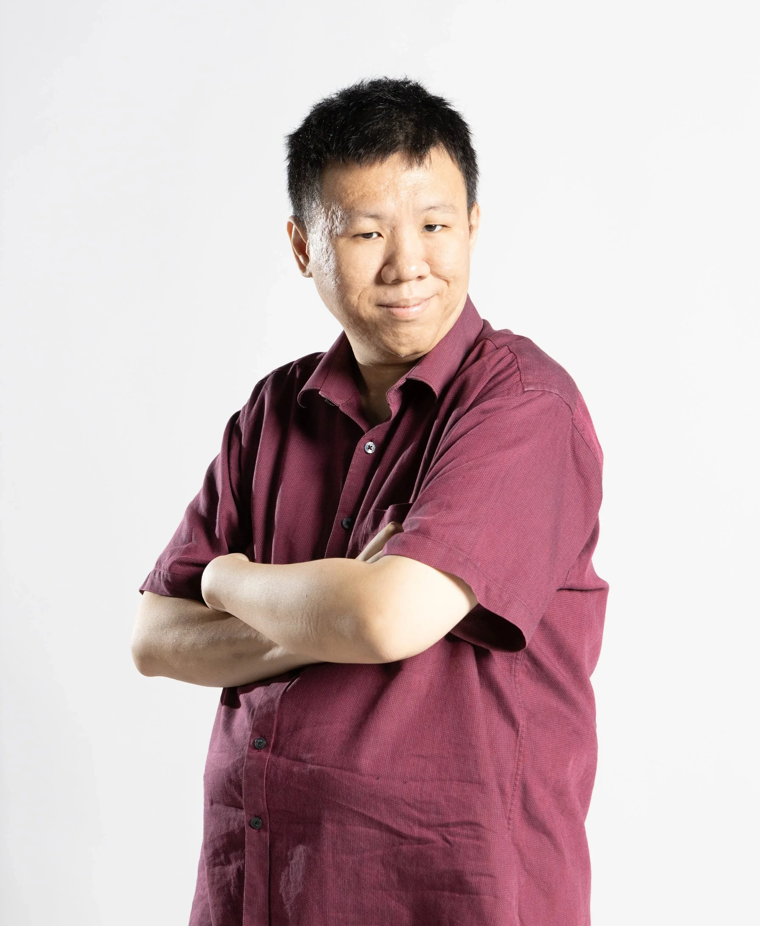 A neurodivergent team member employed at PUPA Center, contributing professional skills and lived experience to inclusive education and program development.