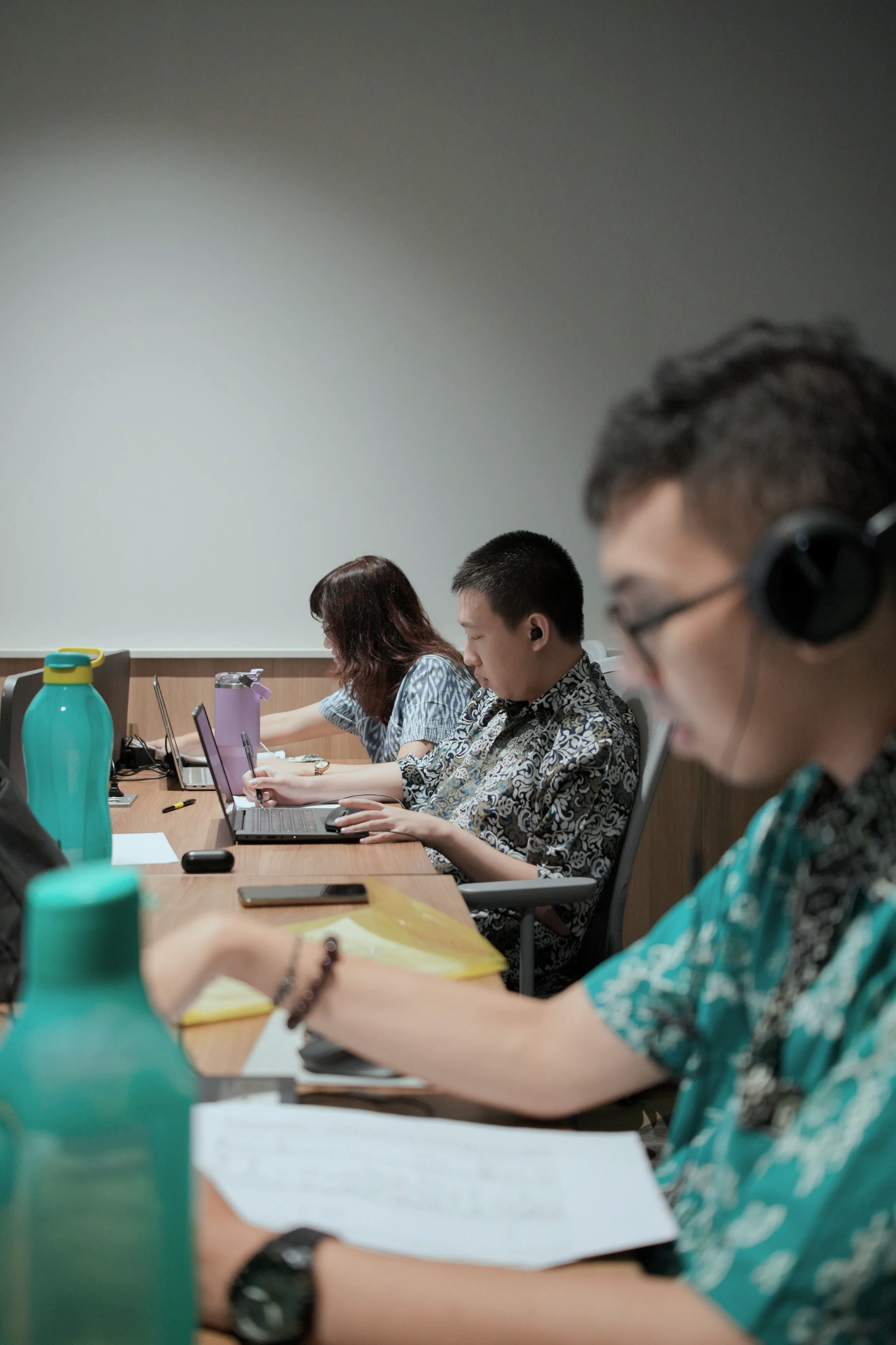 Participants engaged in a structured collaborative work session at PUPA Center, building focus, teamwork, and digital task skills in an inclusive environment.