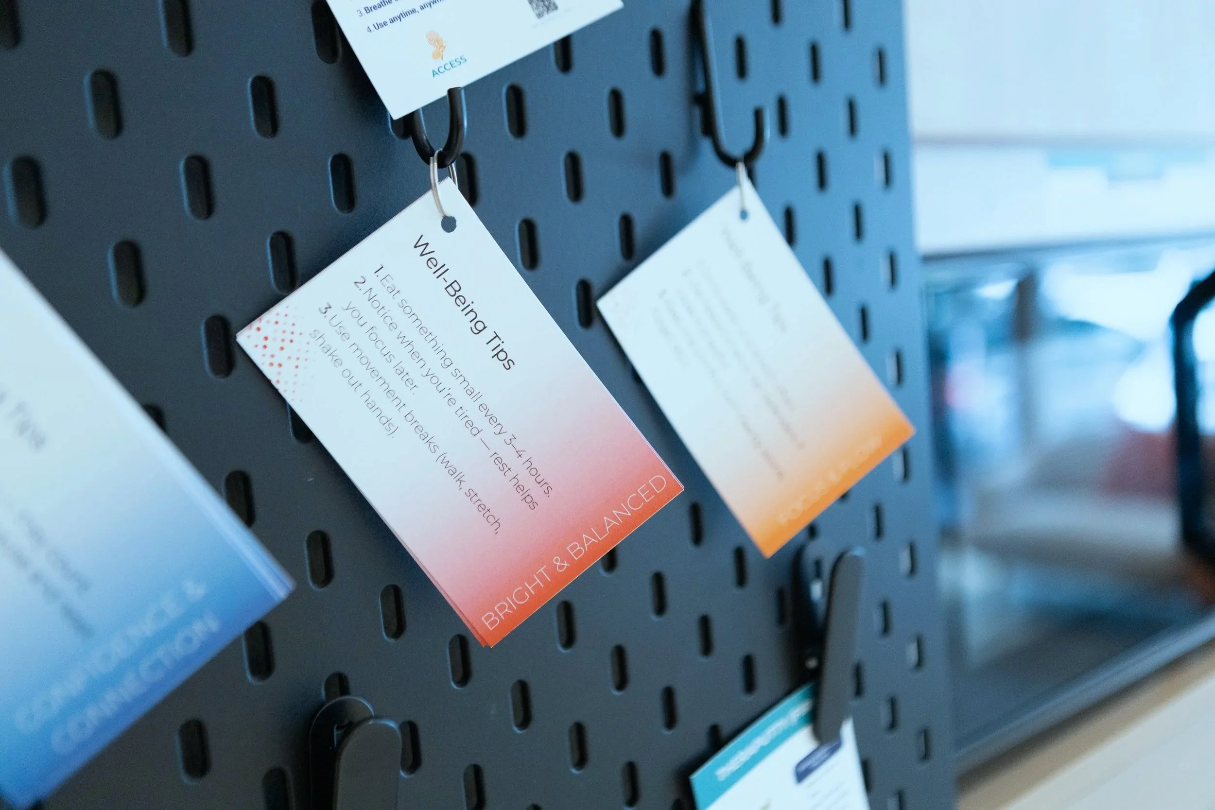 Sensory tools and well-being station at PUPA Center supporting neurodivergent participants in self-regulation, energy management, and balanced daily routines.