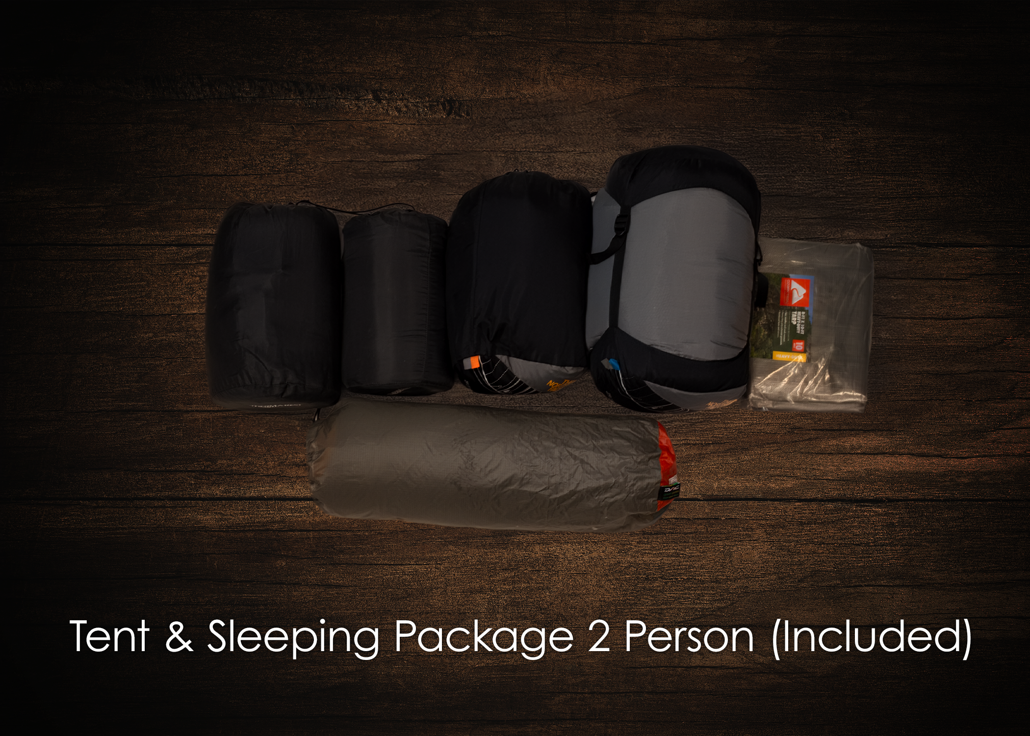 Six bags of camping gear including tents and sleeping packages laid out on a wooden floor with a caption that reads 'Tent & Sleeping Package 2 Person (Included)'.
