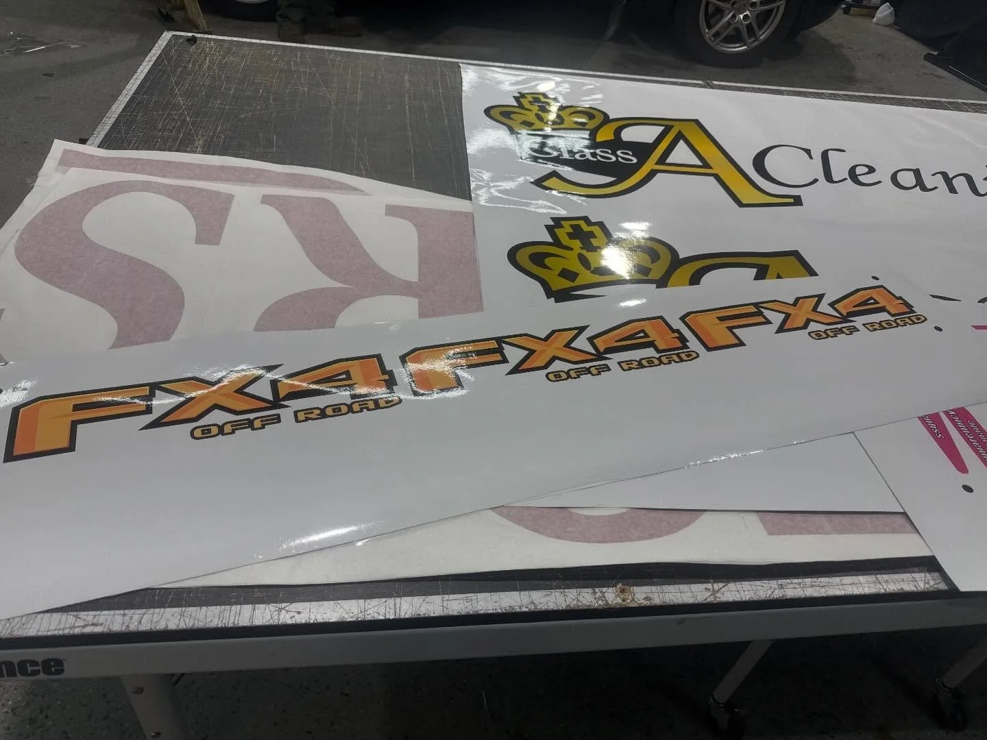 Custom cut Porters graphics for one of their concrete trucks, Class A Cleaning lettering for one of their fleet vehicles and custom design and printed Ford FX4 bedside decals.