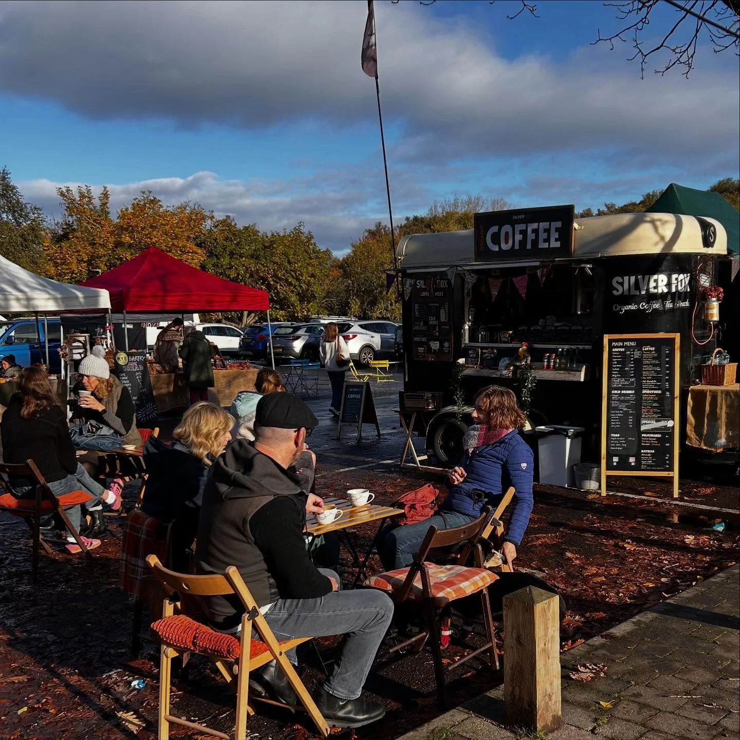 people sitting; drinking coffee
