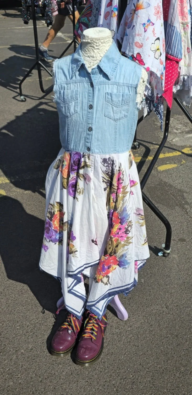 Blue denim vest, and white dress