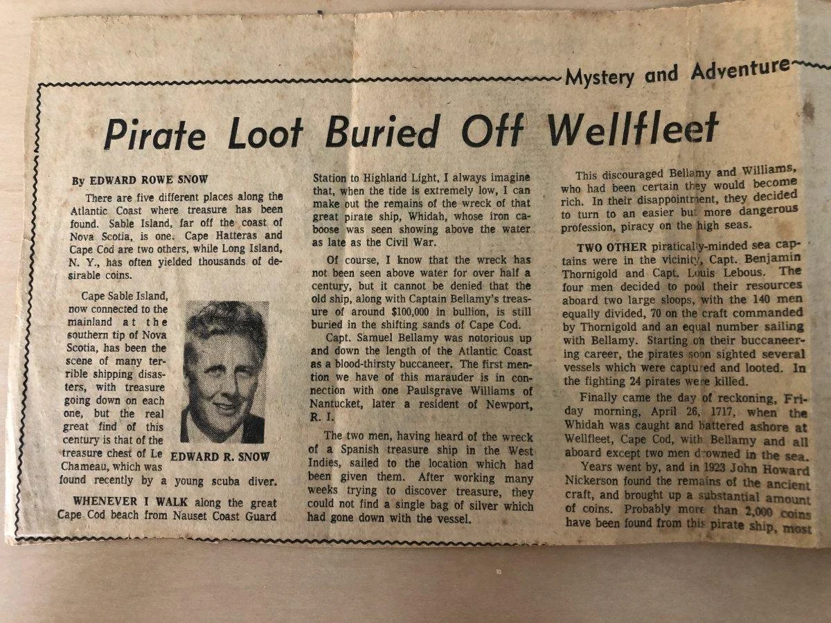 Newspaper article titled "Pirate Loot Buried Off Wellfleet" by Edward Rowe Snow, with a black-and-white photo of a man labeled Edward R. Snow. The article discusses shipwrecks and pirate treasure on the Atlantic coast, including Cape Cod, Nova Scotia, and Long Island, and mentions the wreck of a Spanish treasure ship. It describes the history of these shipwrecks and treasure hunts, including stories of pirates and treasure discoveries.