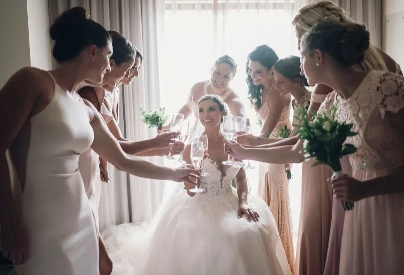 A joyful wedding morning in Italy with the bride and her bridesmaids, featuring polished and durable hair and makeup styling by Cecilia Acquaroli to ensure everyone feels entirely themselves
