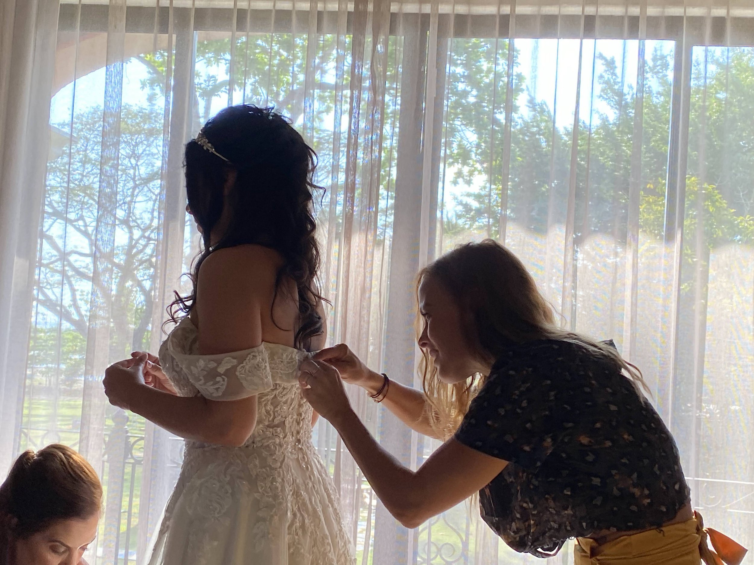 The final adjustments before the veil is placed