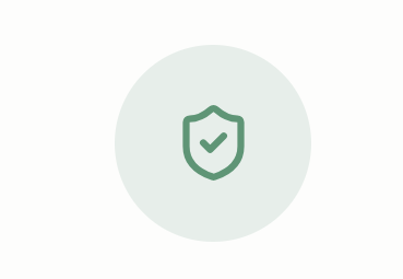 A green shield with a checkmark in the center.