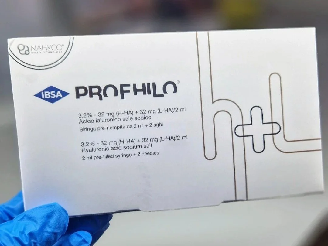 A box of Profhilo, a hyaluronic acid skin treatment product, held by a person in a blue glove in Lisburn