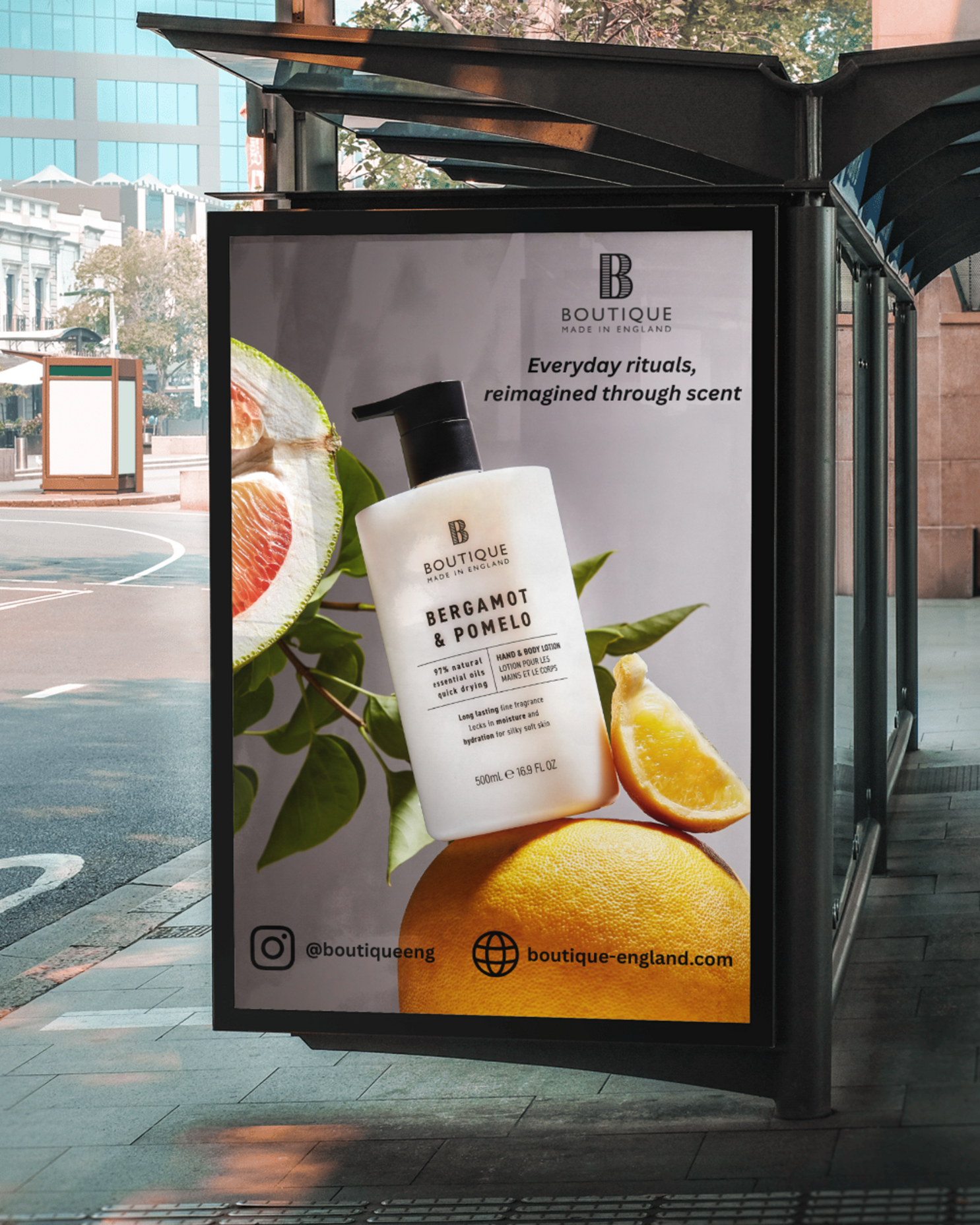 Advertisement for skincare brand Boutique with a bottle of Bergamot and Pomelo body lotion, featuring a halved pomelo, lemon, and grapefruit, and the brands social media and website details.