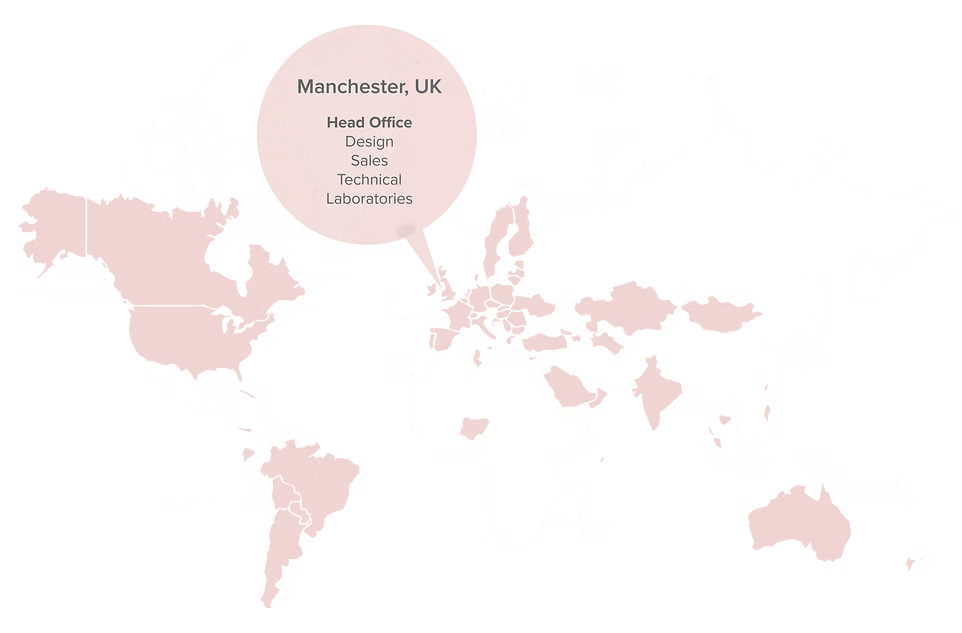 World map showing business locations with a focus on Manchester, UK, highlighting its head office and departments such as design, sales, technical, and laboratories.