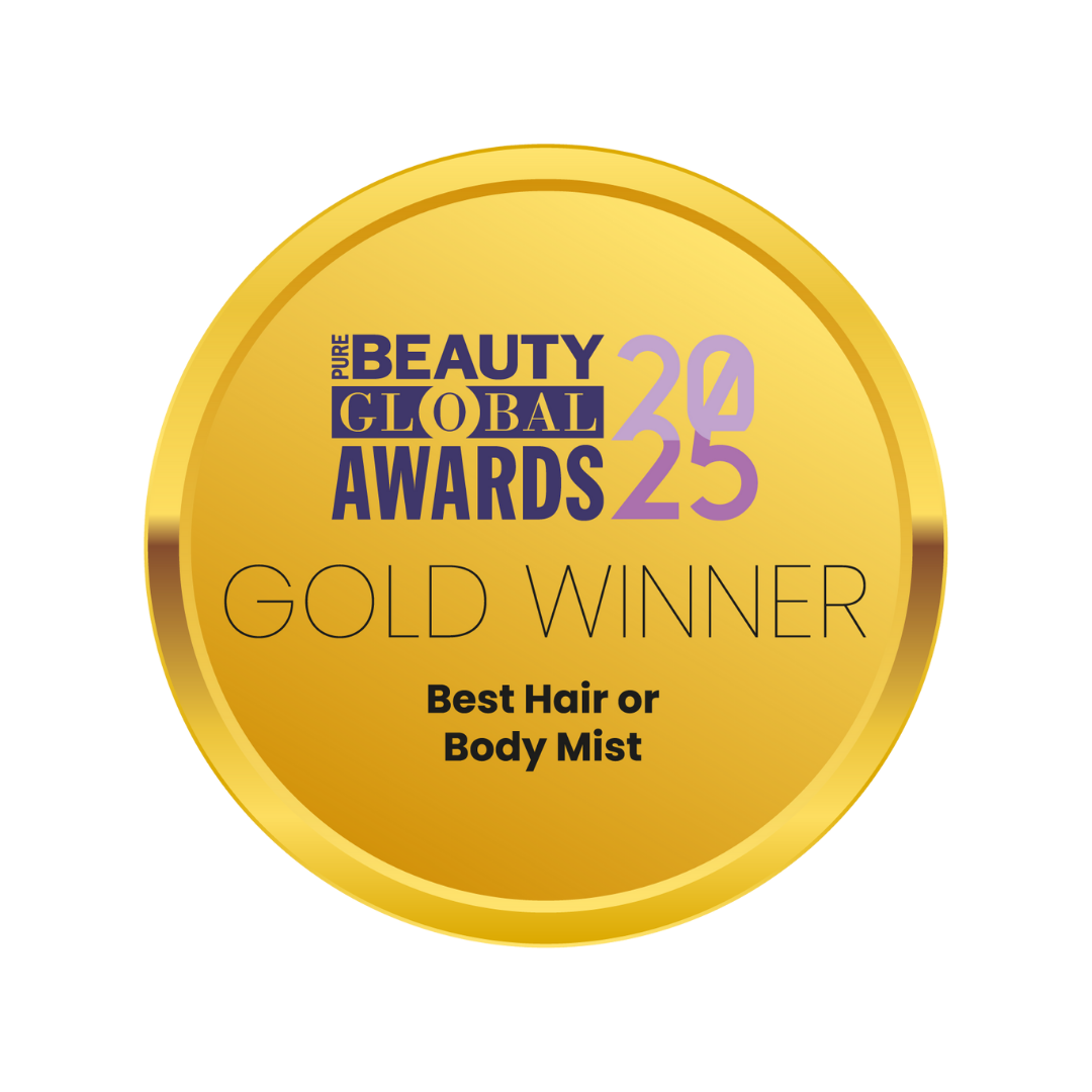 Gold award medal for the Pure Beauty Global Awards 2025, indicating a gold win in the Best Hair or Body Mist category.