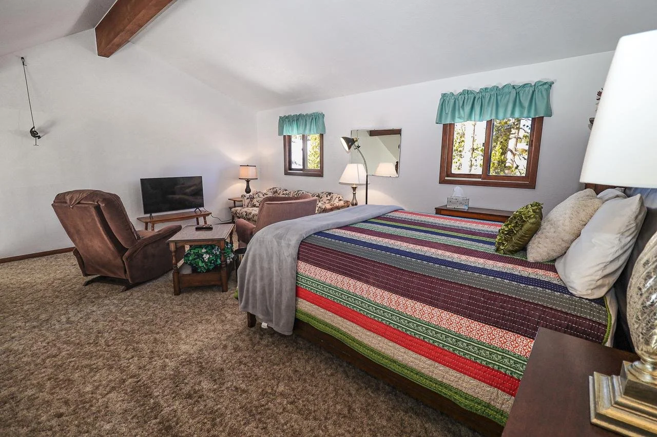 Queen Bed in Open Loft and Entertainment Space.jpg