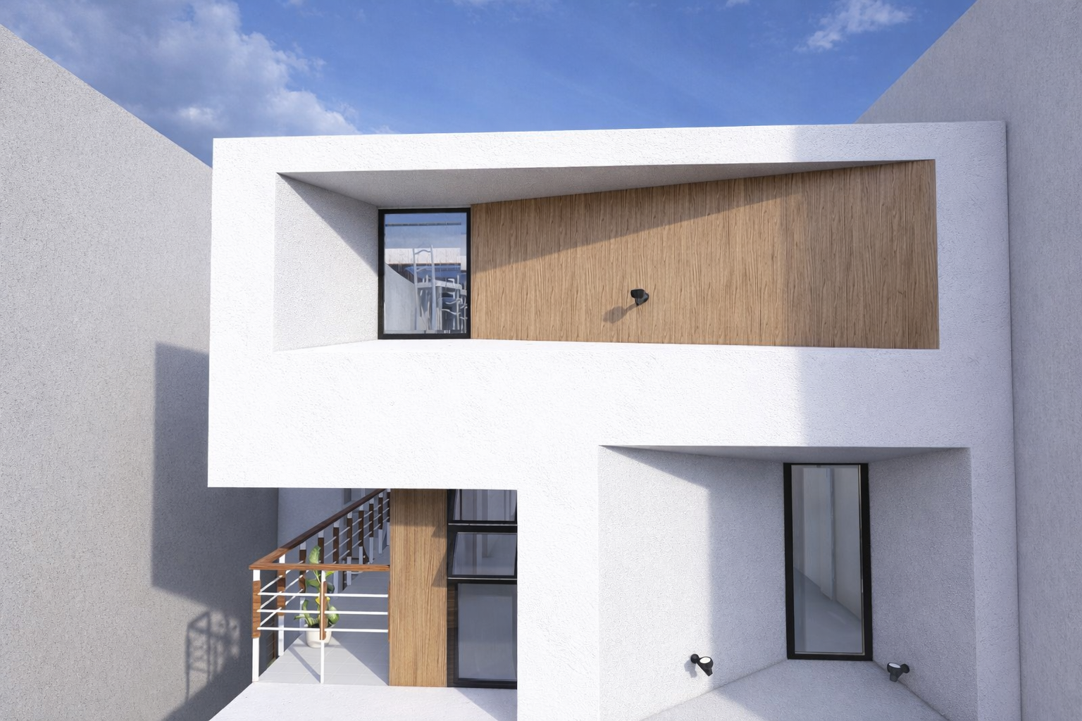 Minimalist two-storey building with white stucco walls, wood accents, and exposed staircase design.