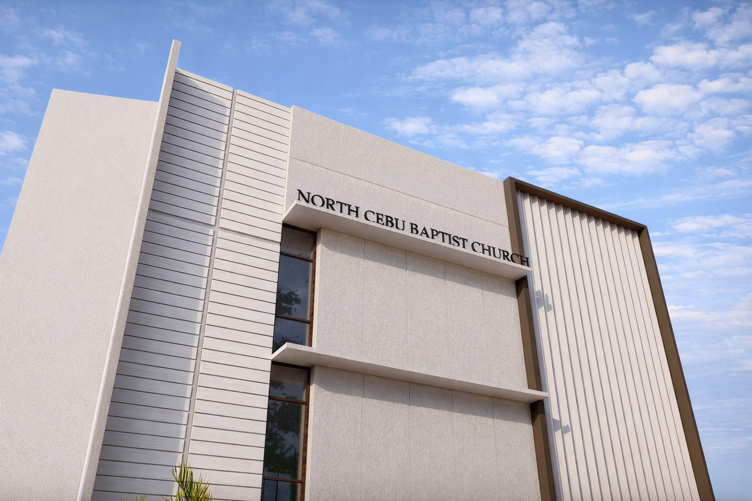Modern multi-storey church building with sleek lines, large windows, and a vertical facade panel.