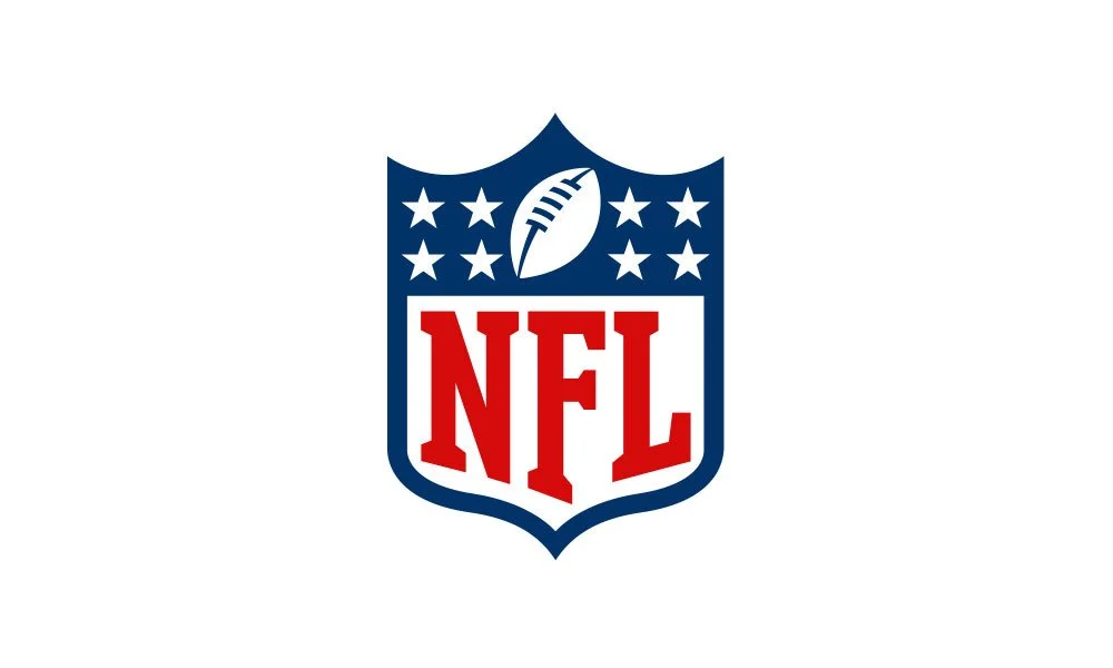 NFL logo featuring a football, stars, and the letters 'NFL' in red.