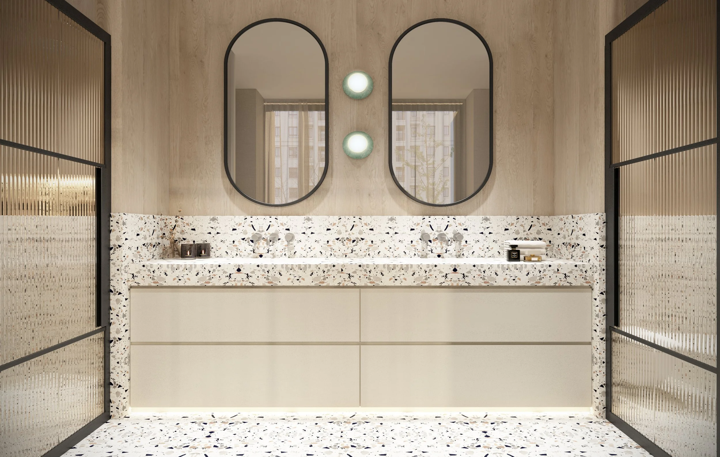 Modern bathroom vanity with terrazzo countertop, two oval mirrors above, two wall-mounted lights, and decorative shelving with plants and toiletries