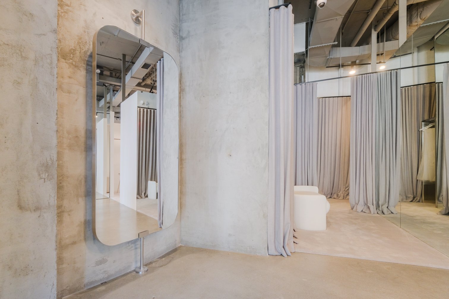 bridal showroom fitting rooms curtain partitions architectural interior photography