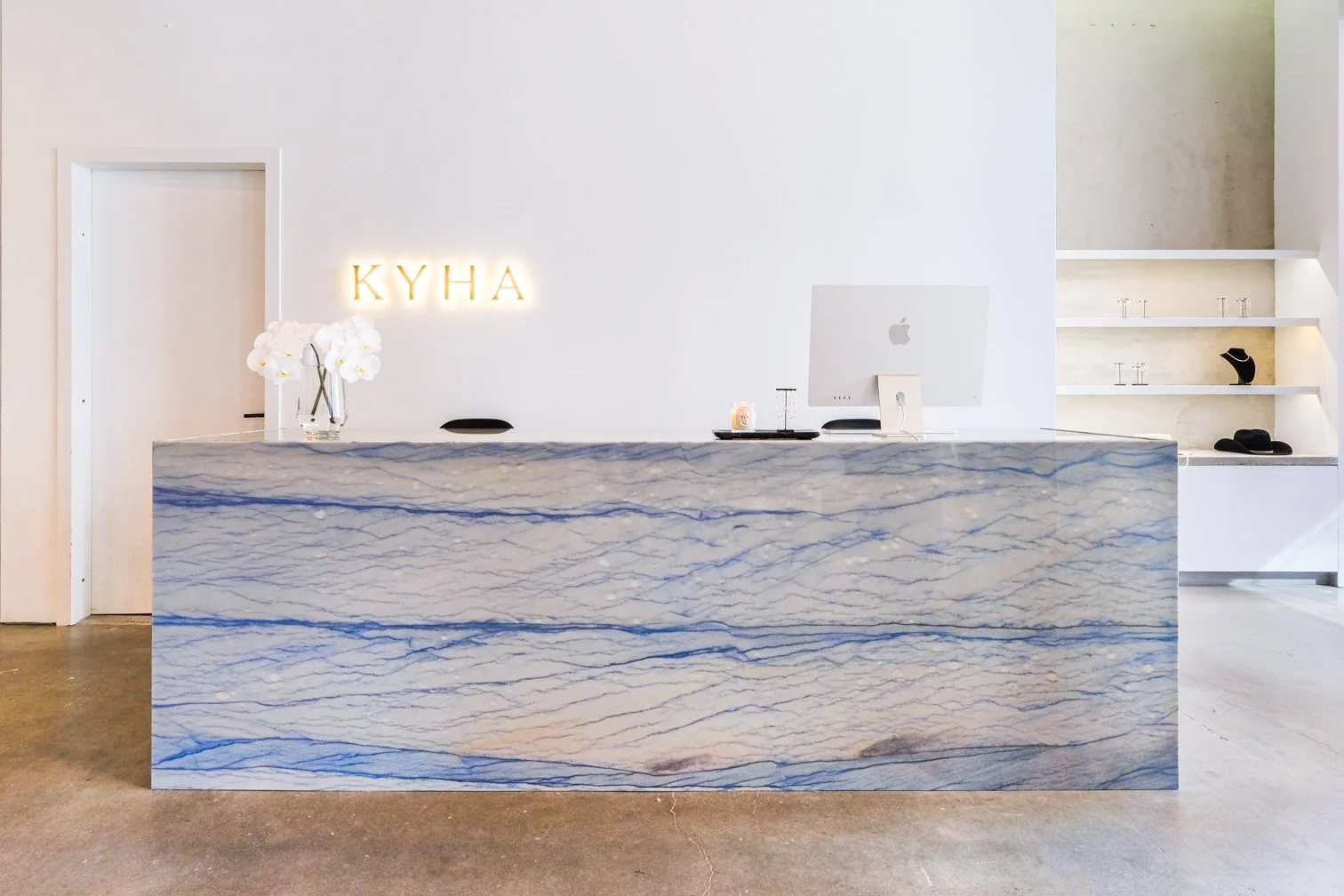 luxury retail interior marble reception desk new york showroom