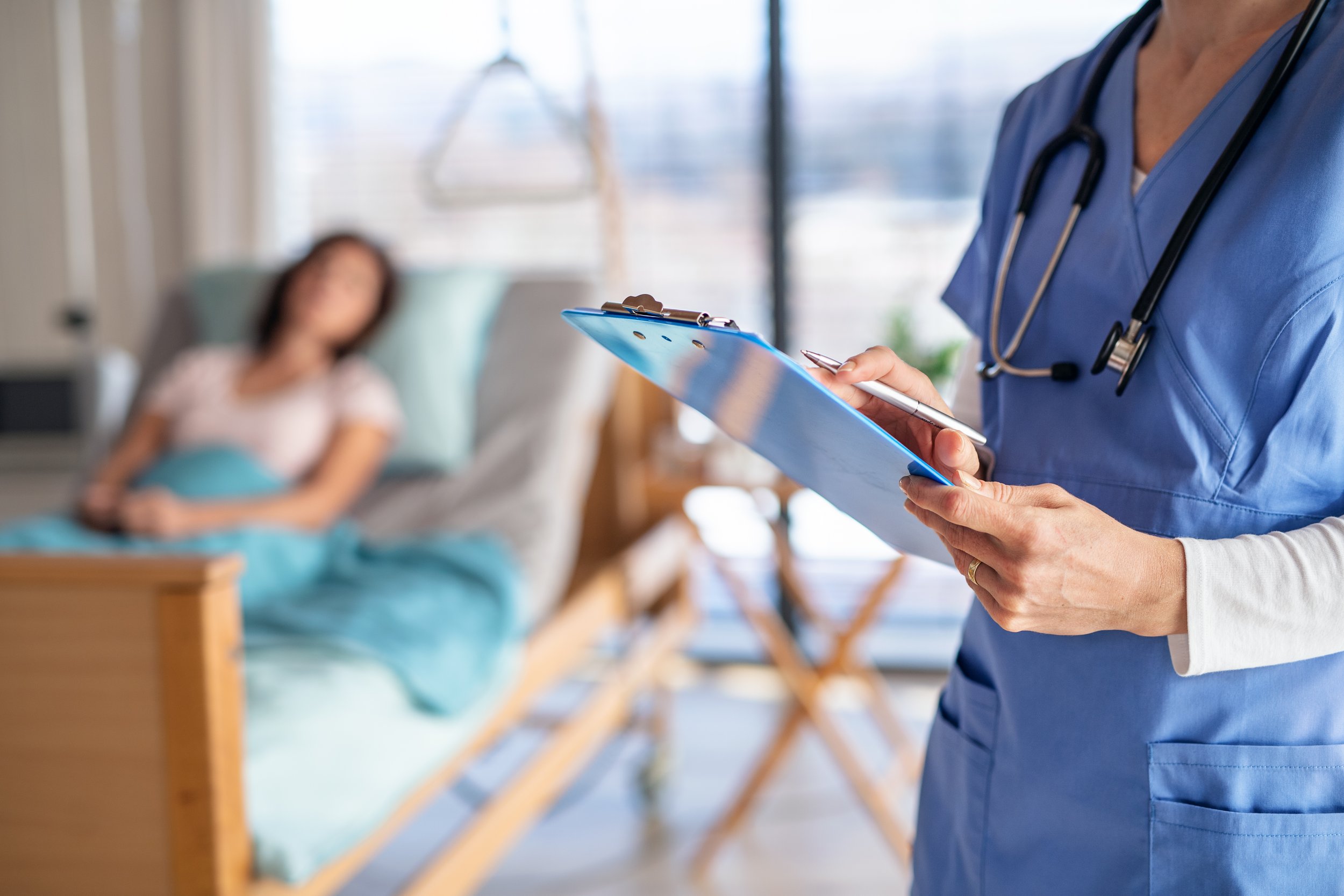 unrecognizable-doctor-or-nurse-standing-in-hospita-2024-10-18-09-51-01-utc.jpg