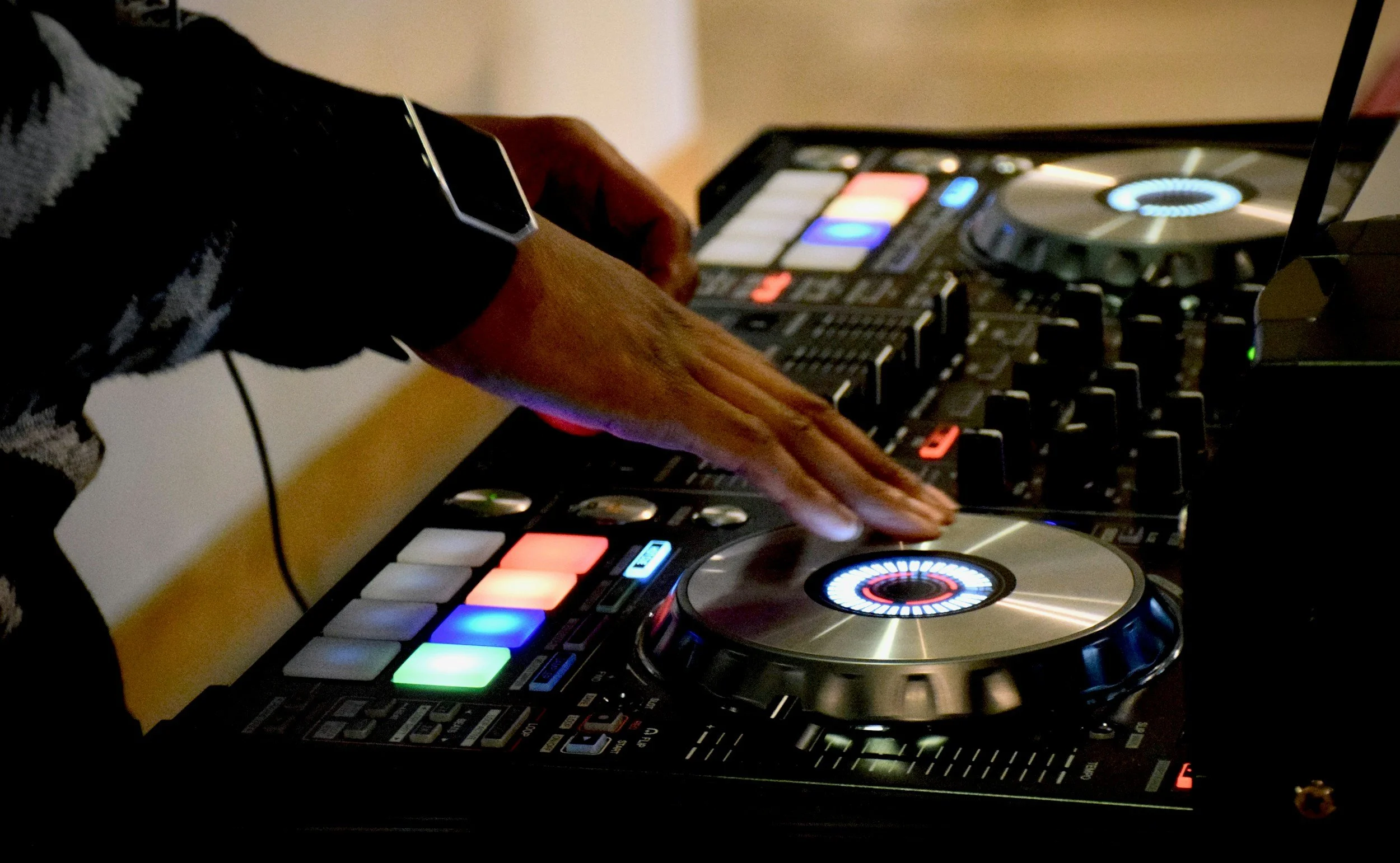 Live DJ mixing dance-floor favorites at The Wiggle Room in Marble Hill, GA