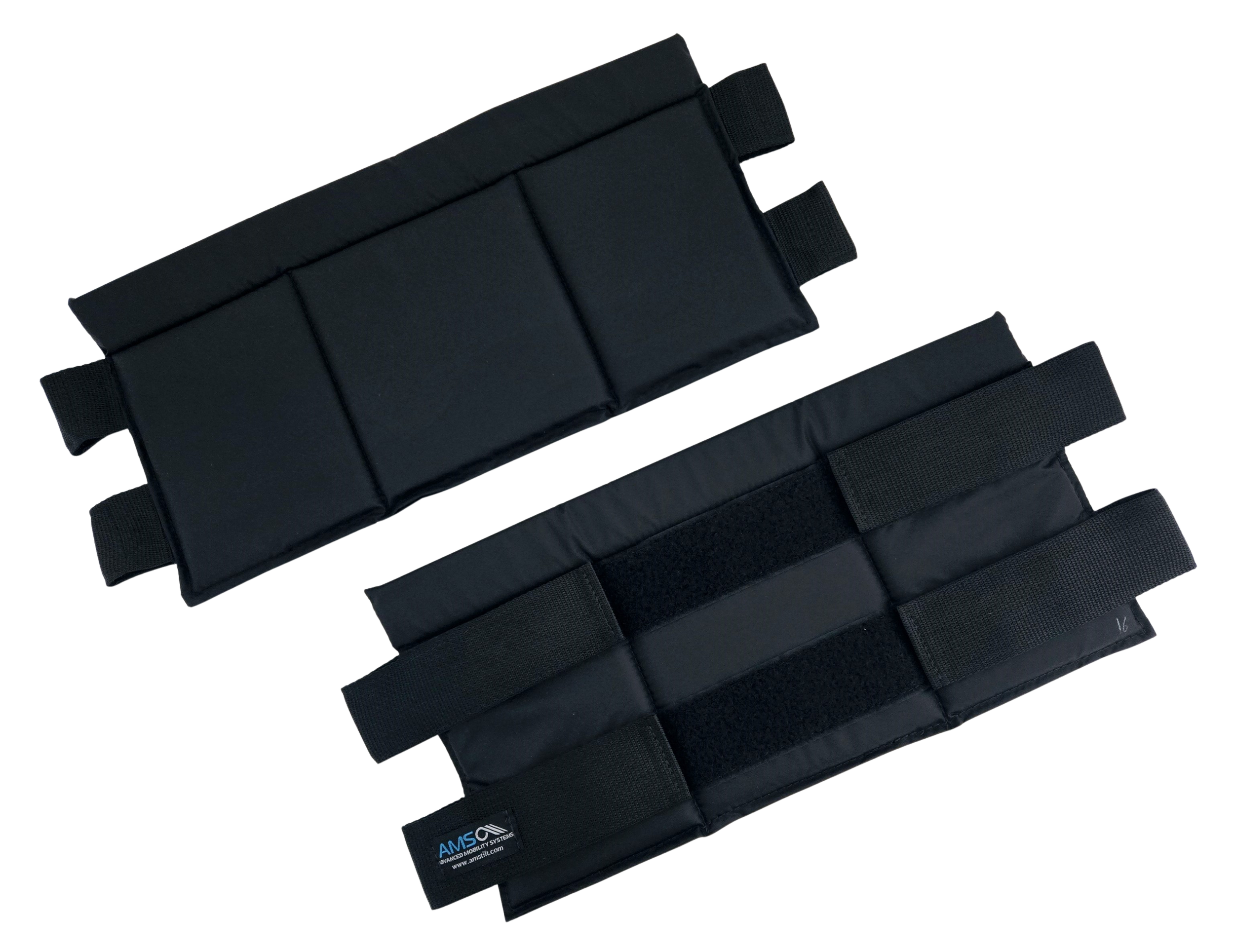 Two black padded wrist supports with adjustable straps, used for weightlifting or physical therapy.