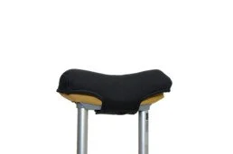 Suspended bicycle seat with black cushion and yellow base on metal supports