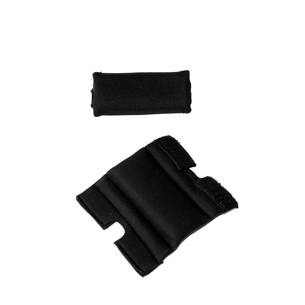 Pair of black wristbands, one is a plain fabric band, the other has velcro straps.