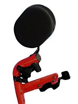 A black round pad attached to a red adjustable mount or stand