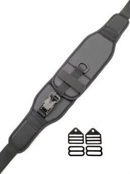 A gray adjustable strap with a buckle and attachment point, paired with a graphic of two black and white shoe insoles.