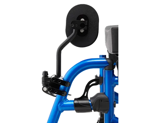 Close-up of a blue mobility scooter handle with a black wheel, secured with black brackets, attached to a black seat backrest, with a blue frame and a black control panel.