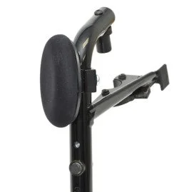 A treadmill with a black and gray control panel and an attached safety key clip.