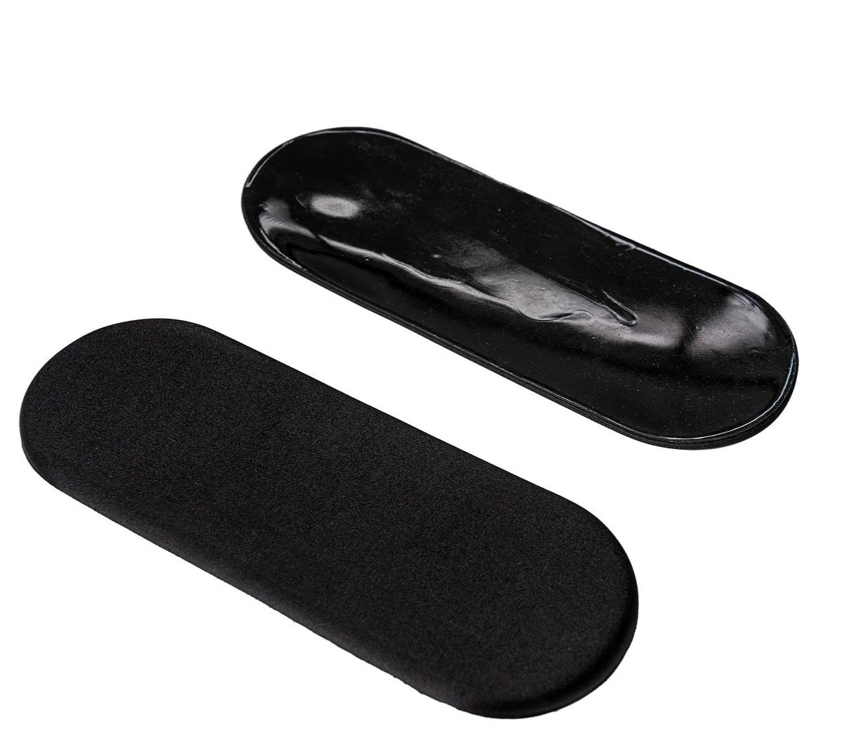 A black nail file and a black polishing buffer, both with oval shapes and smooth surfaces.
