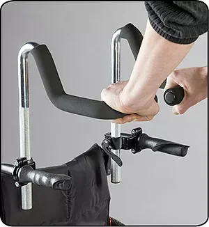 Person using a screwdriver to attach a black cloth or cover to a walker.