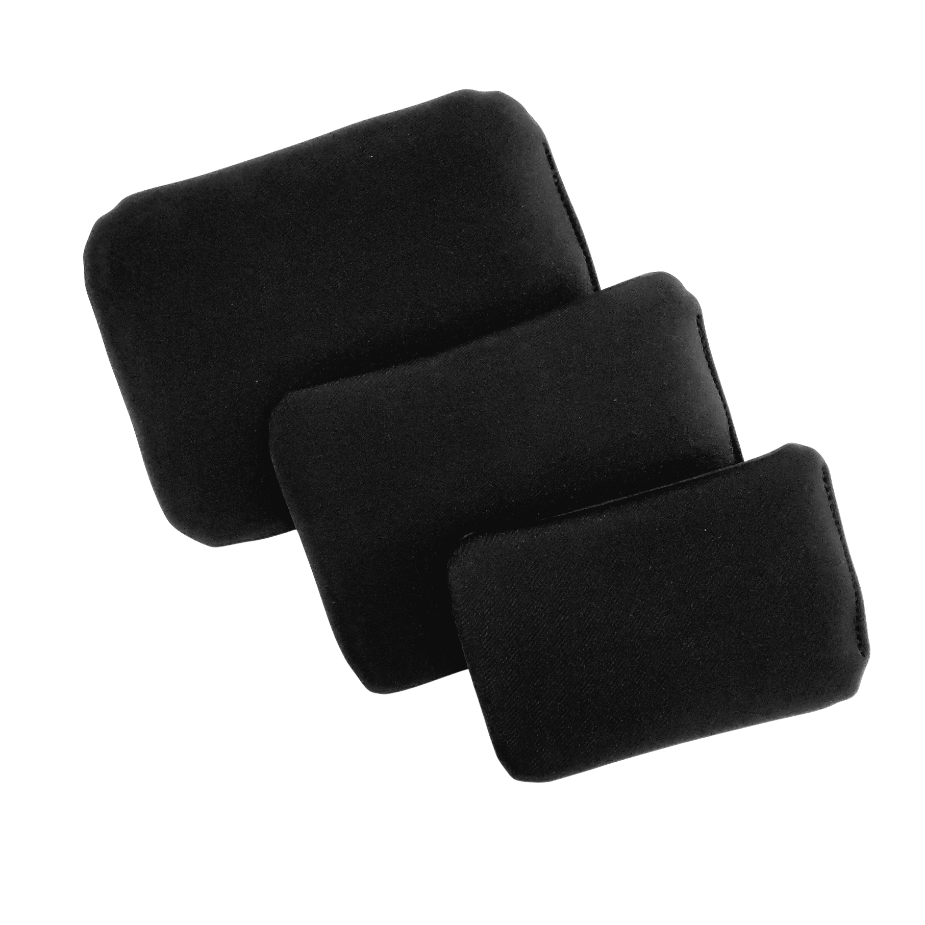 Three black rectangular microphone windscreen covers stacked on top of each other.