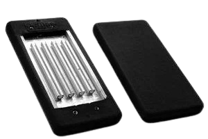 Mobile phone with a set of screwdrivers inside the screen and a black case beside it.