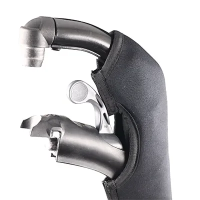 A close-up of a caddy with golf clubs inside, including one with a silver head and a black cover.