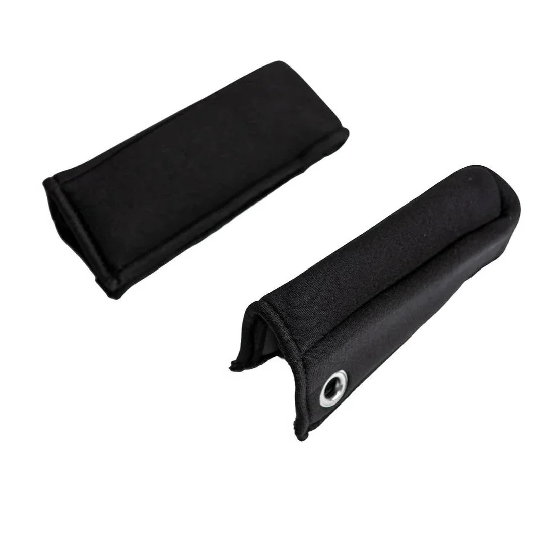 Two black pencil cases, one with a zipper closure and the other with a grommet for attaching a strap.