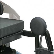 Close-up of a black medical examination chair with an attached armrest, set against a white background.