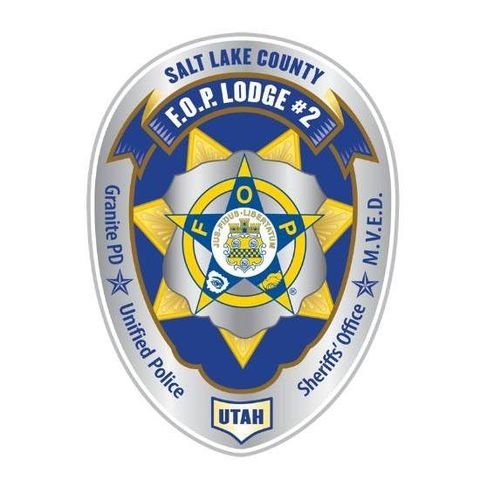 A badge displaying "Salt Lake County F.O.P. Lodge #2" with a blue and gold star design. It mentions "Granite PD," "Unified Police," "Sheriff's Office," and "M.V.E.D." at the borders. The badge features the state "Utah" at the bottom.
