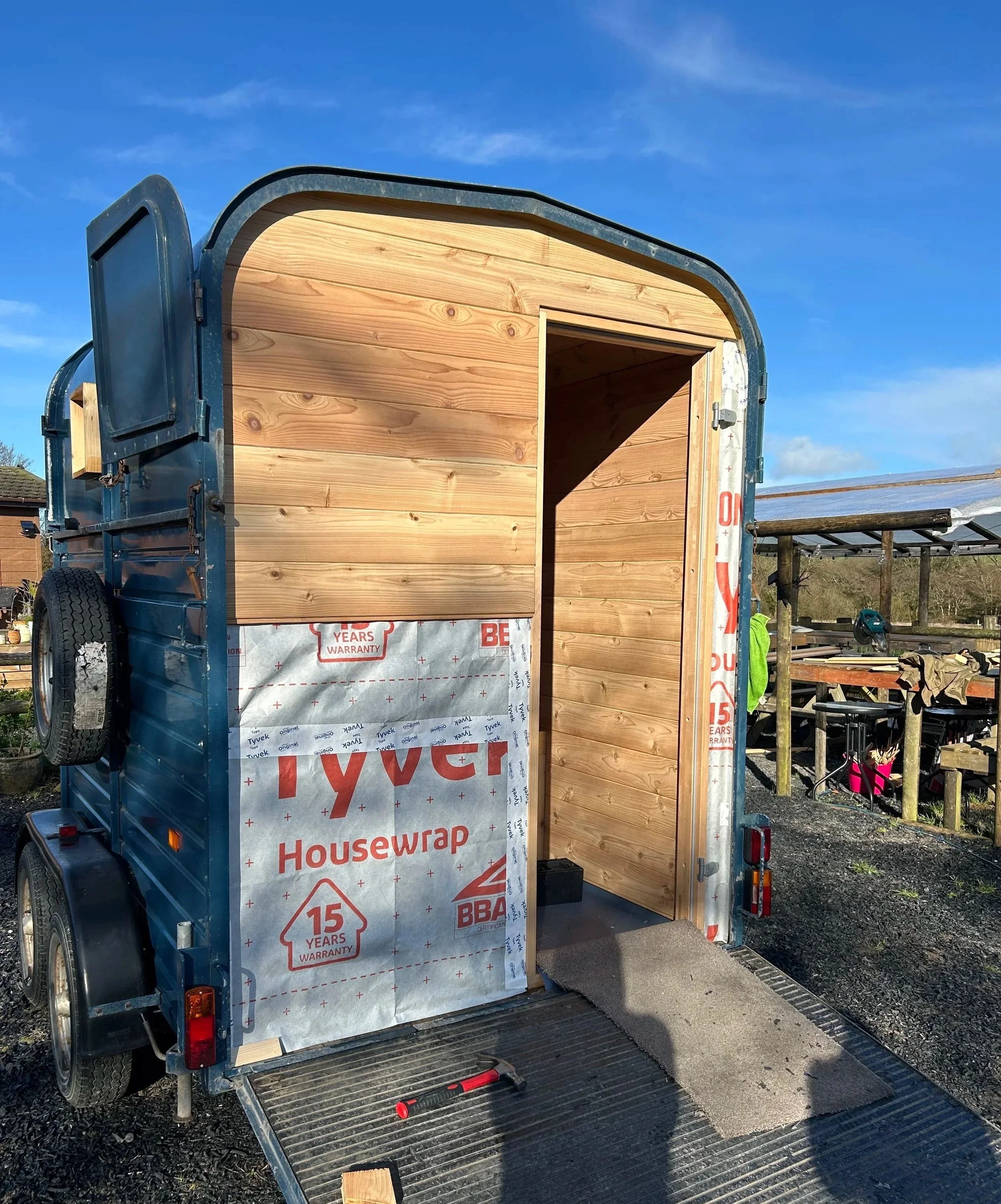The dividing wall of the sauna, showing tyvek house wrap covering the insulation, all being covered by Cedar. Image taken during construction, the drift sauna is now made from Cedar and based in Abbotsham, Bideford, at Livit Adventures.